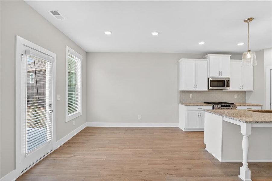 Furnished interior view inside a new home in The Fairways at Mirror Lake, Villa Rica (Image 12).