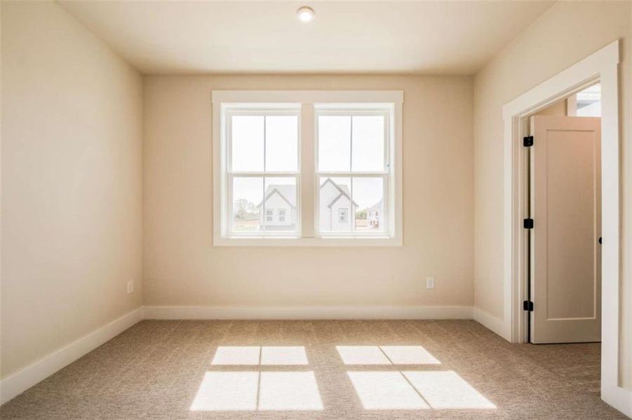 Spacious, unfurnished interior of a new home in The Paddocks at Doc Hughes, Buford (Image 46).