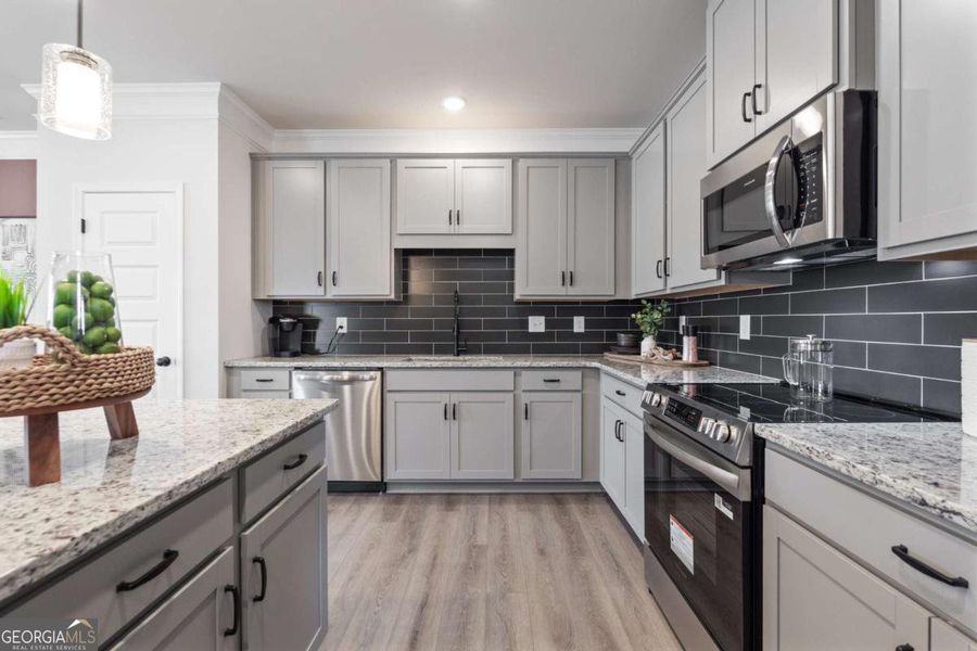 Furnished interior view inside a new home in Crescent Towns, Riverdale (Image 16).