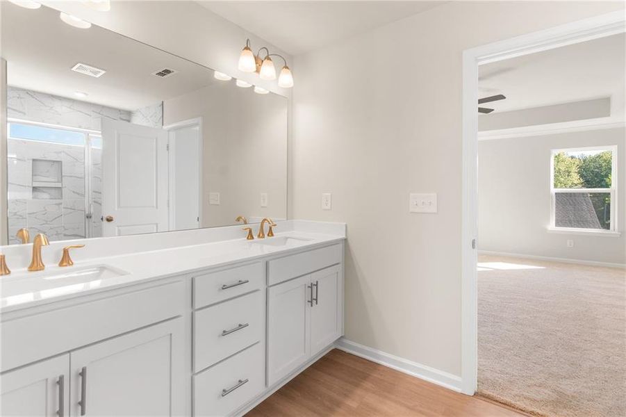 Furnished interior view inside a new home in The Village at Shallowford, Kennesaw (Image 14). Furnished interior view inside a new home in The Village at Shallowford, Kennesaw (Image 14).