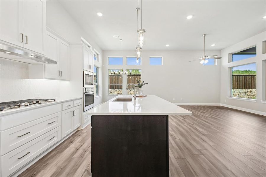 Furnished interior view inside a new home in Elements at Viridian - Garden Series, Arlington (Image 8). Furnished interior view inside a new home in Elements at Viridian - Garden Series, Arlington (Image 8).