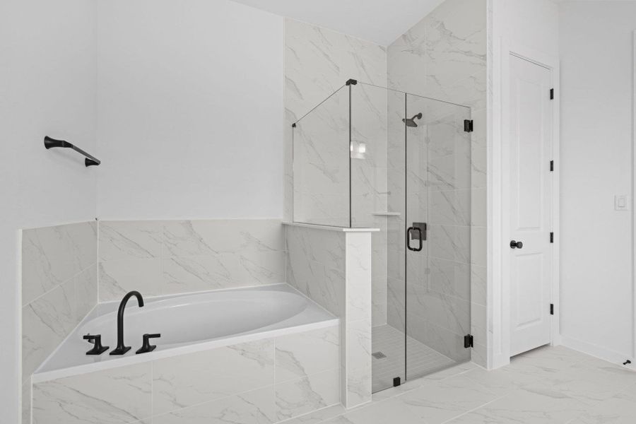 Primary Bath retreat with garden tub & walk-in shower Primary Bath retreat with garden tub & walk-in shower