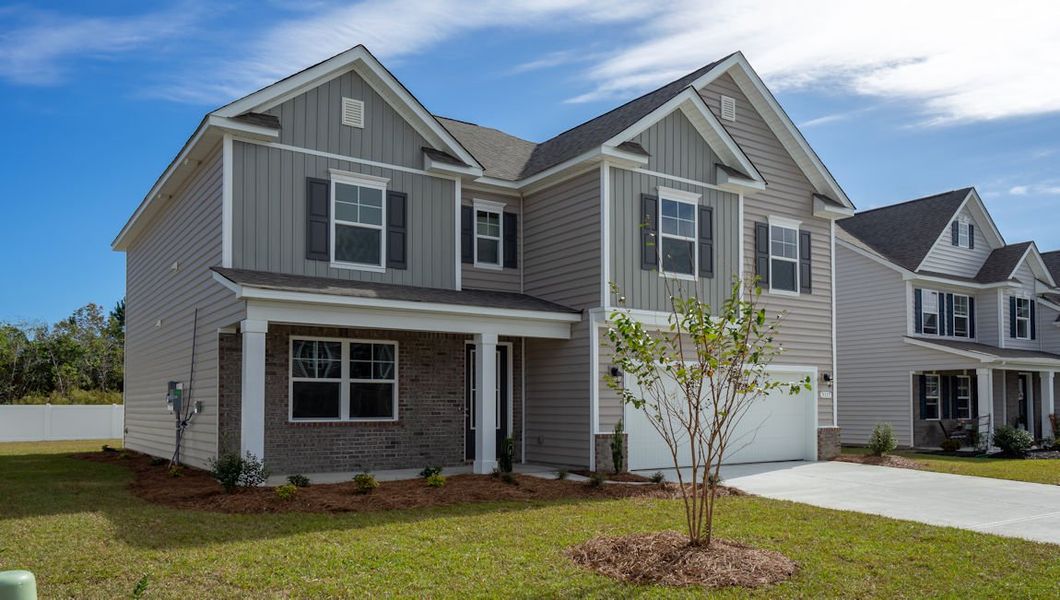 Representative exterior photo of a completed home built from the GLYNN by D.R. Horton in Waterbridge, Myrtle Beach, SC (Image 18). Representative exterior photo of a completed home built from the GLYNN by D.R. Horton in Waterbridge, Myrtle Beach, SC (Image 18).