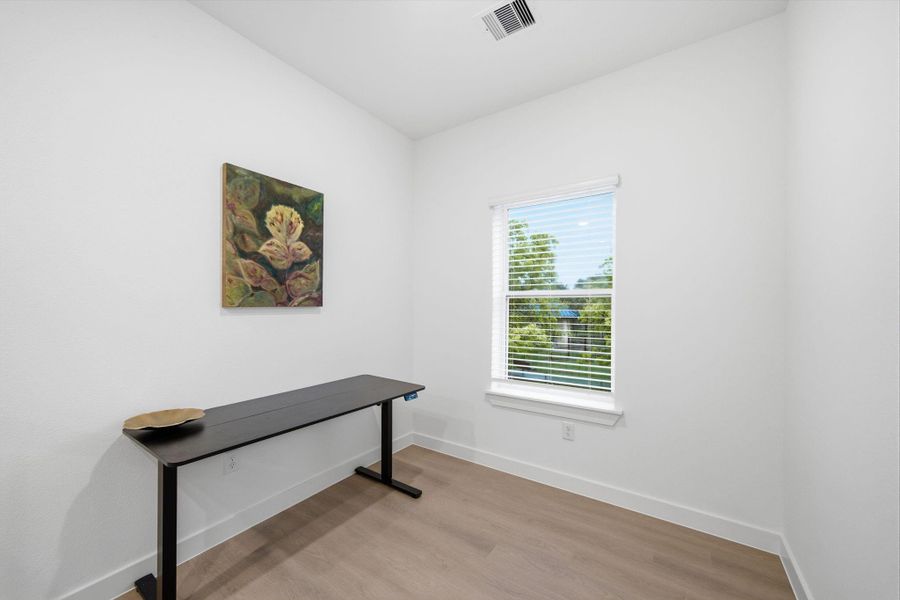 Upstairs landing space makes for the perfect office, reading corner, or workout space. Upstairs landing space makes for the perfect office, reading corner, or workout space.