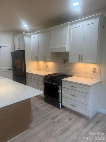 Furnished interior view inside a new home in , Hickory (Image 9).