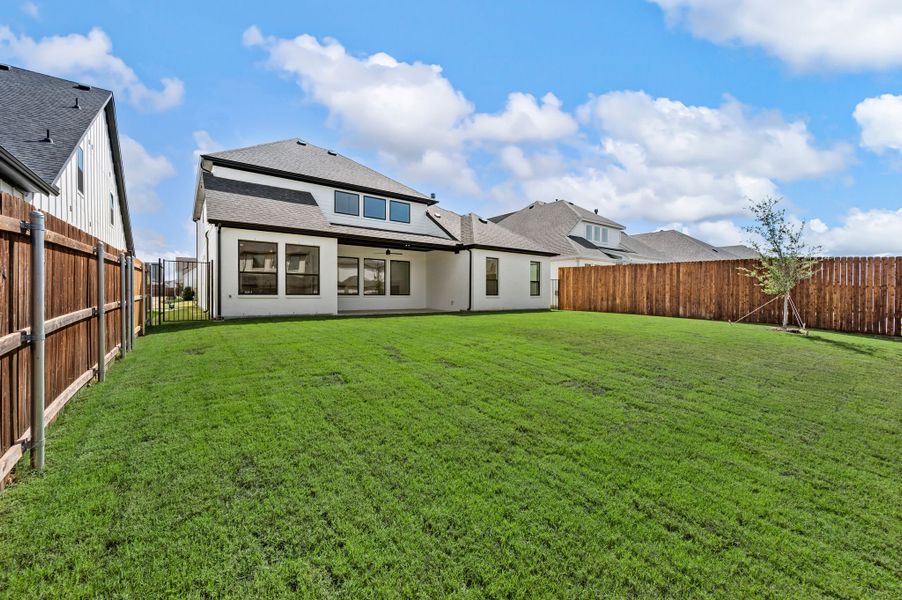 Exterior details and patio area of a home in Parks of Aledo, Aledo (Image 27).