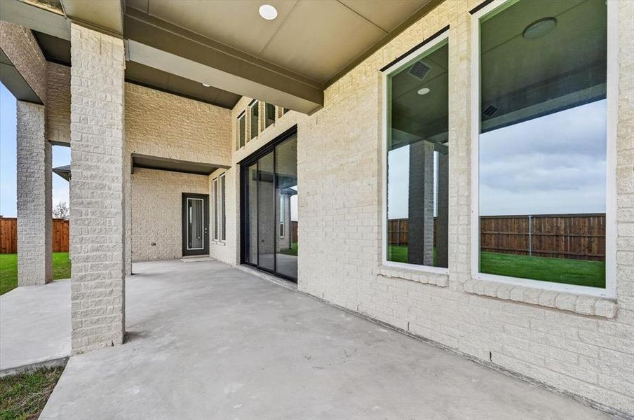 Exterior details and patio area of a home in The Parks at Wilson Creek, Celina (Image 2).
