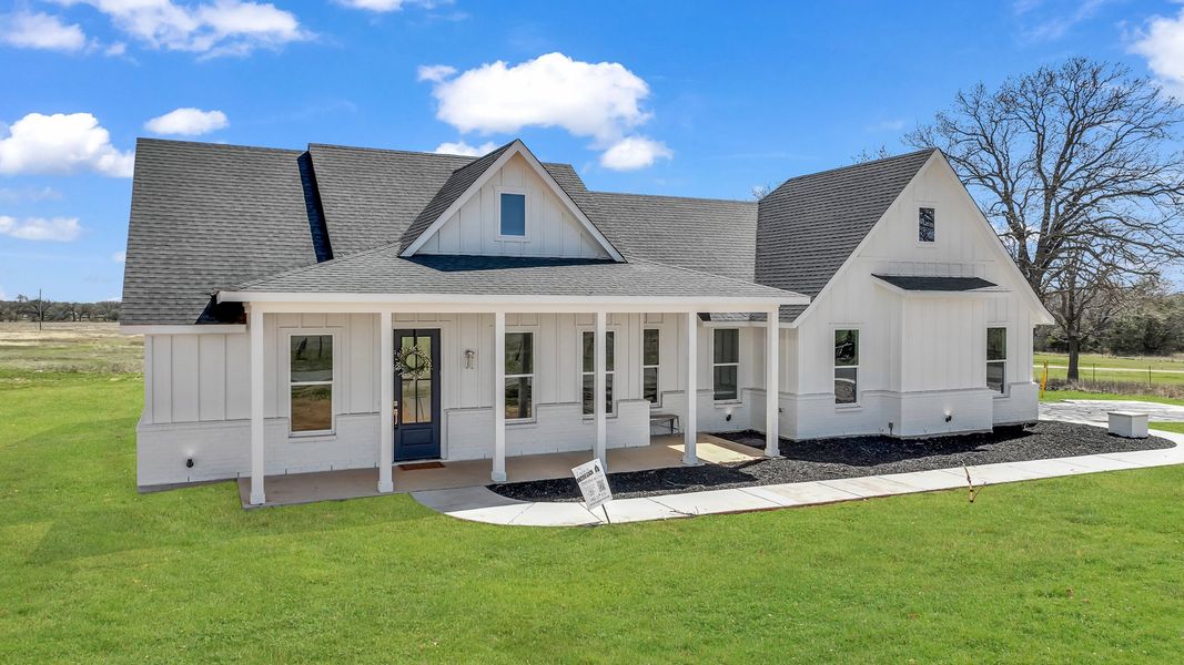 Representative exterior photo of a completed home built from the Clementine by Zeal Home Builders in Saddle Crest Estates, Weatherford, TX (Image 31).