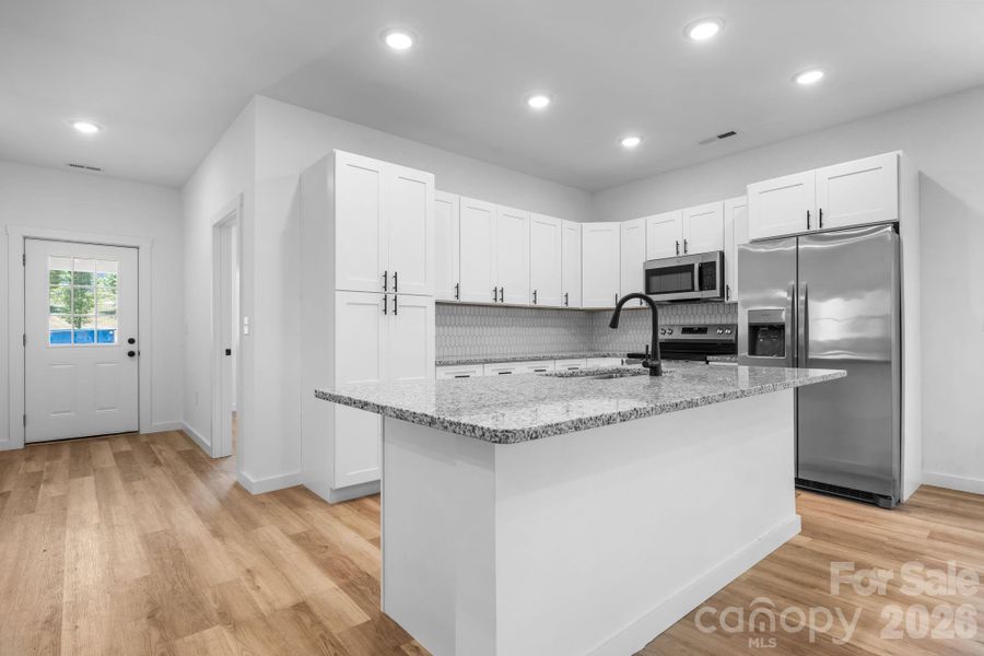 Furnished interior view inside a new home in , Taylorsville (Image 6).