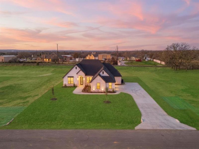 Front exterior of a new home in , Azle, TX, highlighting curb appeal (Image 26).