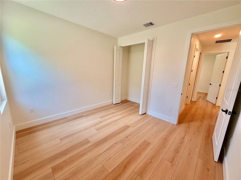 Spacious, unfurnished interior of a new home in , Port Charlotte (Image 53).