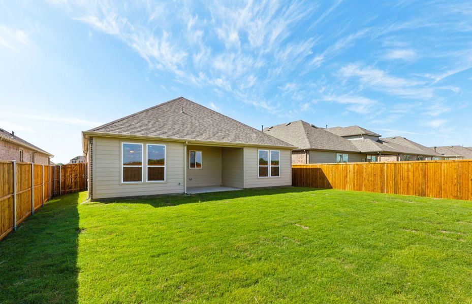 Exterior details and patio area of a home in Pecan Square, Northlake (Image 2). Exterior details and patio area of a home in Pecan Square, Northlake (Image 2).