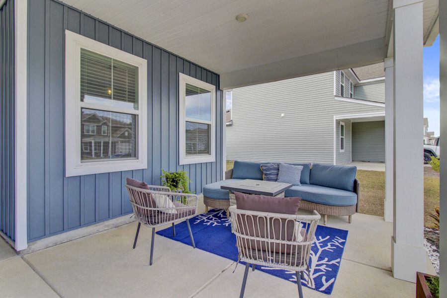 Exterior details and patio area of a home in Sanctuary Cove at Cane Bay, Summerville (Image 27).