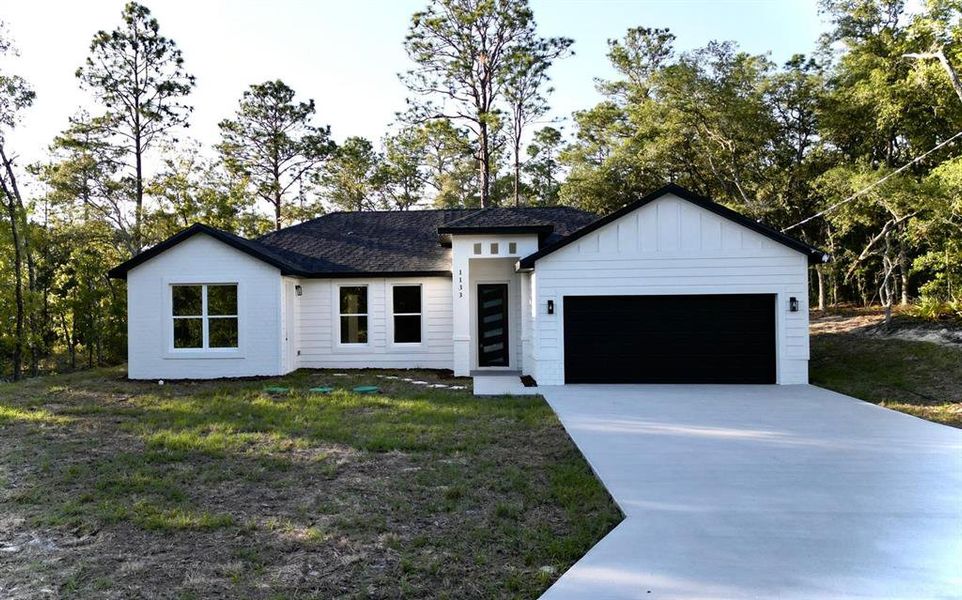 Front exterior of a new home in , Dunnellon, FL, highlighting curb appeal (Image 1). Front exterior of a new home in , Dunnellon, FL, highlighting curb appeal (Image 1).