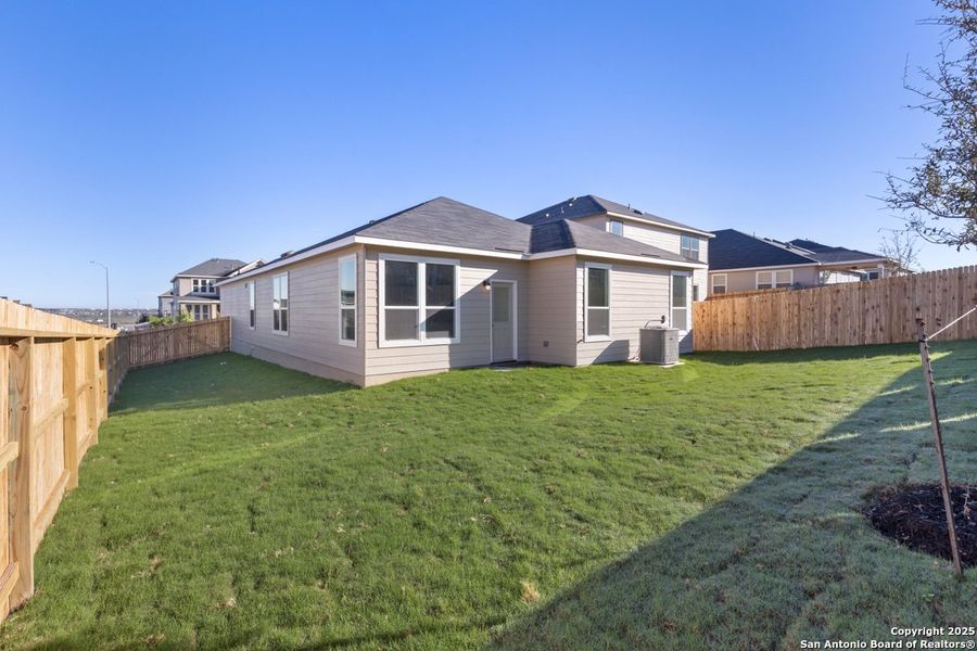 Exterior details and patio area of a home in Knox Ridge, Converse (Image 3).