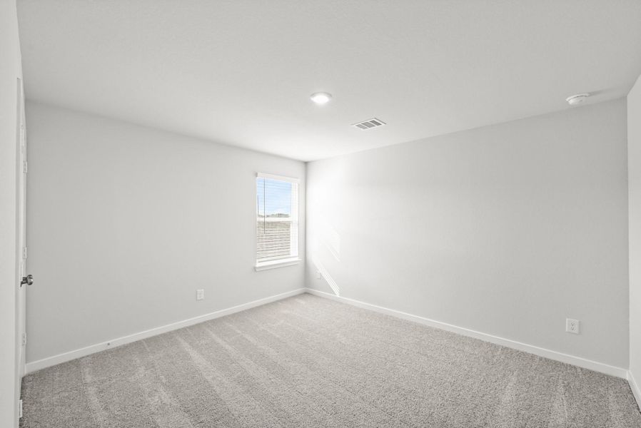 Spacious, unfurnished interior of a new home in Sunterra, Katy (Image 35).