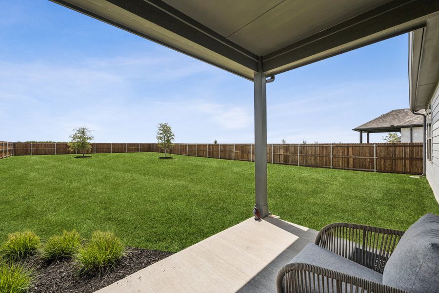 Covered Patio in the Winters home plan by Trophy Signature Homes – REPRESENTATIVE PHOTO Covered Patio in the Winters home plan by Trophy Signature Homes – REPRESENTATIVE PHOTO