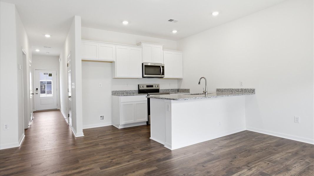 Furnished interior view inside a new home in Cherokee Crossing, Kodak (Image 5).