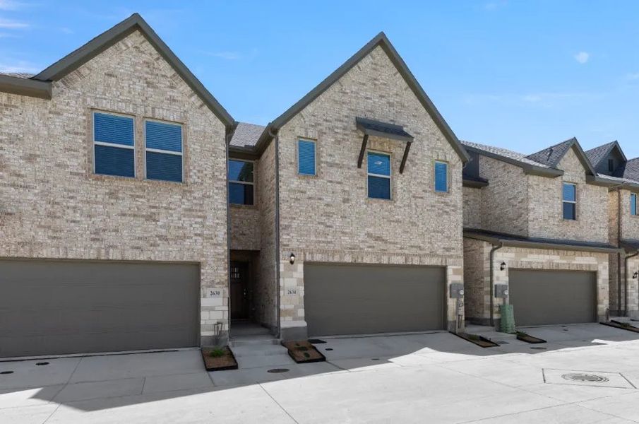 Front exterior of a new home in Sereno Oaks at Buckner Terrace, Dallas, TX, highlighting curb appeal (Image 7).