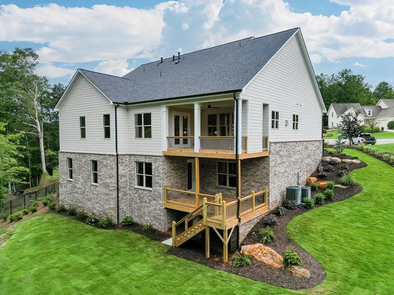 Front exterior of a new home in , Cumming, GA, highlighting curb appeal (Image 26). Front exterior of a new home in , Cumming, GA, highlighting curb appeal (Image 26).