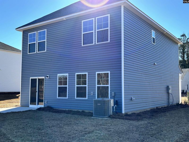 Exterior details and patio area of a home in Rolling Hills, Prosperity (Image 13). Exterior details and patio area of a home in Rolling Hills, Prosperity (Image 13).