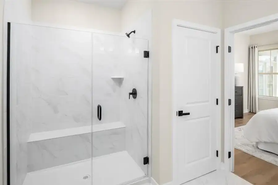Furnished interior view inside a new home in Newberry 55+ Villas, McDonough (Image 17).