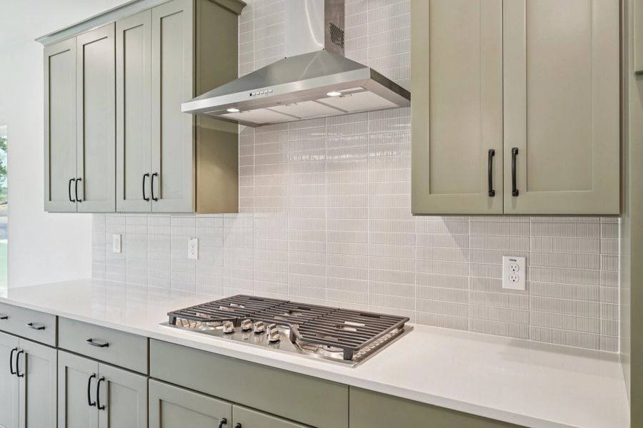 Kitchen featuring the AW Collection® Rosemary - Matte black, light wood, and garden-inspired style. Kitchen featuring the AW Collection® Rosemary - Matte black, light wood, and garden-inspired style.