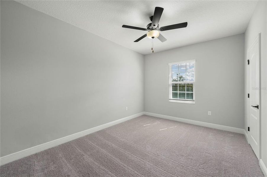 Spacious, unfurnished interior of a new home in Reunion Village, Kissimmee (Image 7).