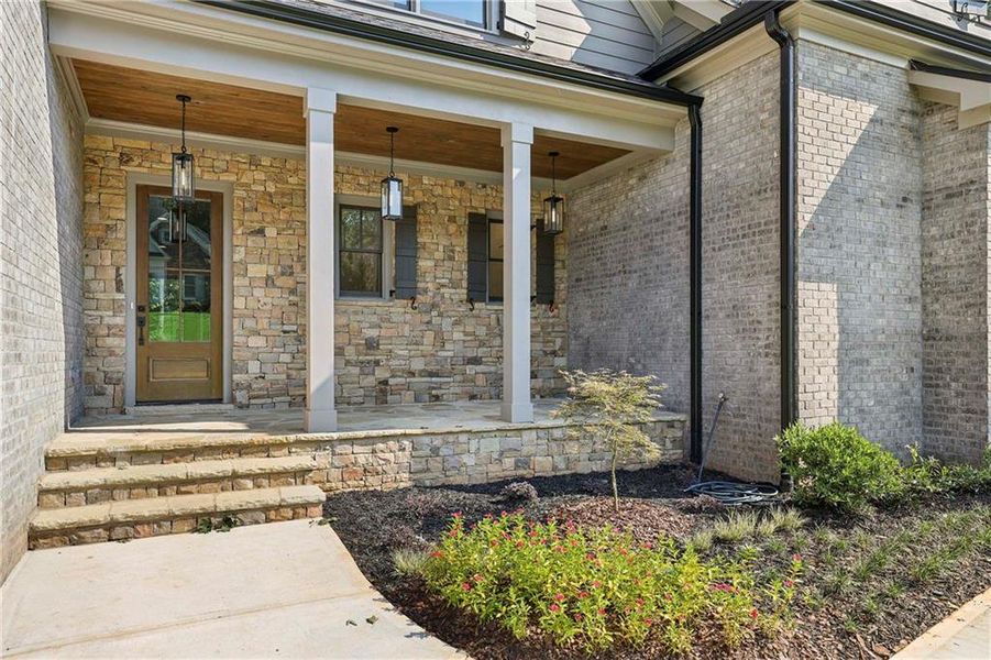 Front exterior of a new home in , Cumming, GA, highlighting curb appeal (Image 2). Front exterior of a new home in , Cumming, GA, highlighting curb appeal (Image 2).