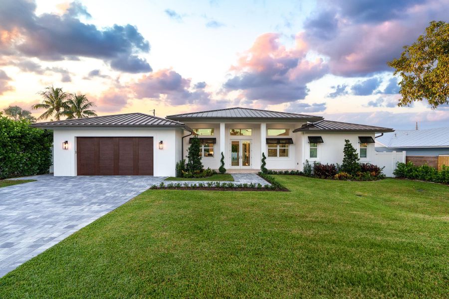 Front exterior of a new home in , Boynton Beach, FL, highlighting curb appeal (Image 21). Front exterior of a new home in , Boynton Beach, FL, highlighting curb appeal (Image 21).