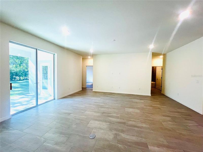 Spacious, unfurnished interior of a new home in Palm Coast: Cornerstone Collection, Palm Coast (Image 16).