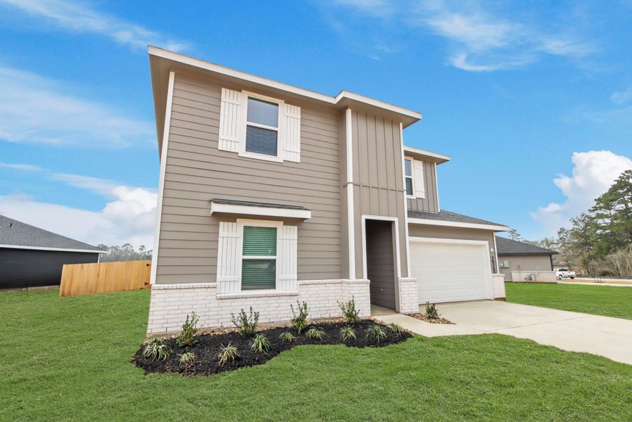 Front exterior of a new home in Chapel Lakes, Montgomery, TX, highlighting curb appeal (Image 21).