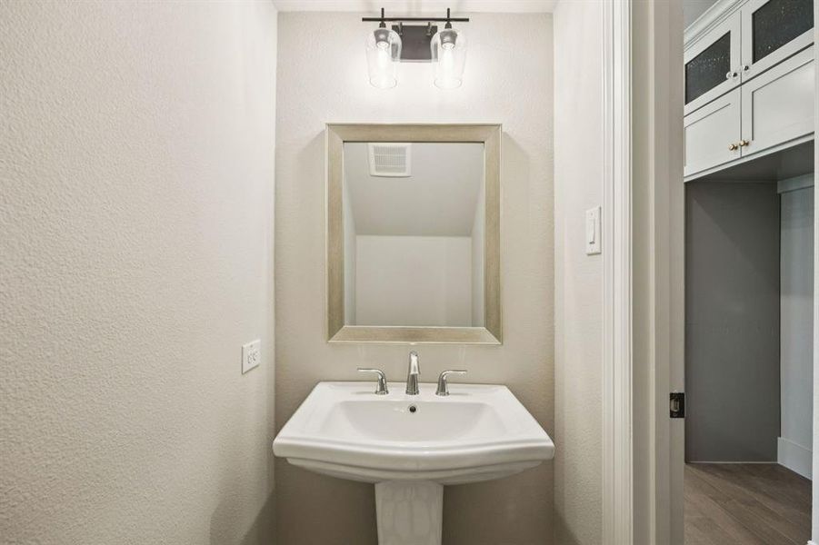 Half bathroom downstairs. Half bathroom downstairs.