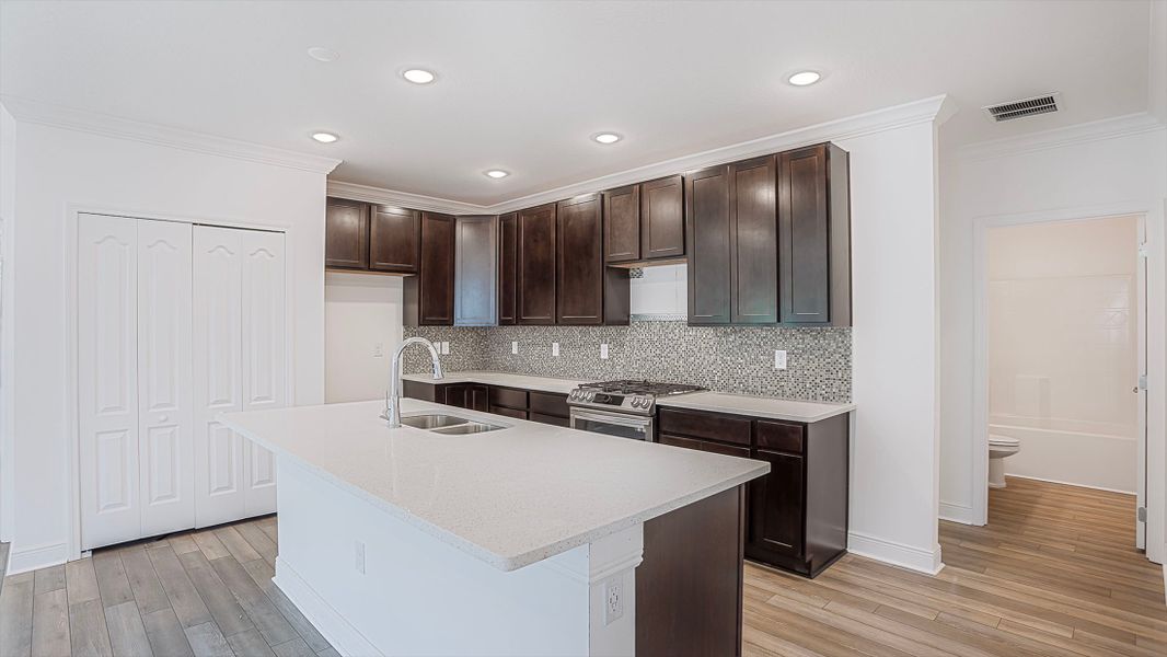 Furnished interior view inside a new home in Heritage Station, Punta Gorda (Image 8).