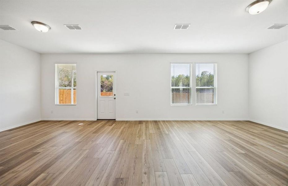 Spacious gathering room with large windows