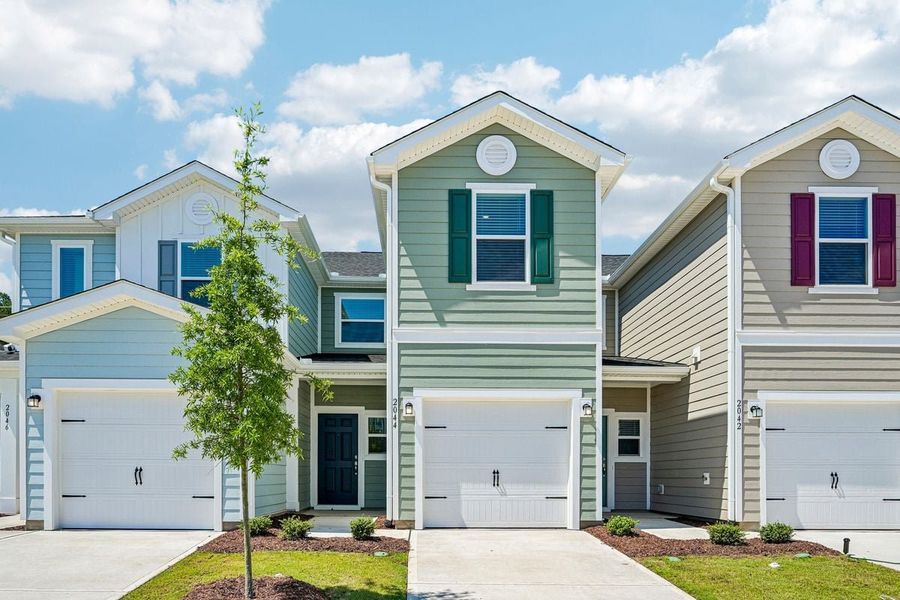 Front exterior of a new home in Brooks Mill - Edge Series, Durham, NC, highlighting curb appeal (Image 1). Front exterior of a new home in Brooks Mill - Edge Series, Durham, NC, highlighting curb appeal (Image 1).
