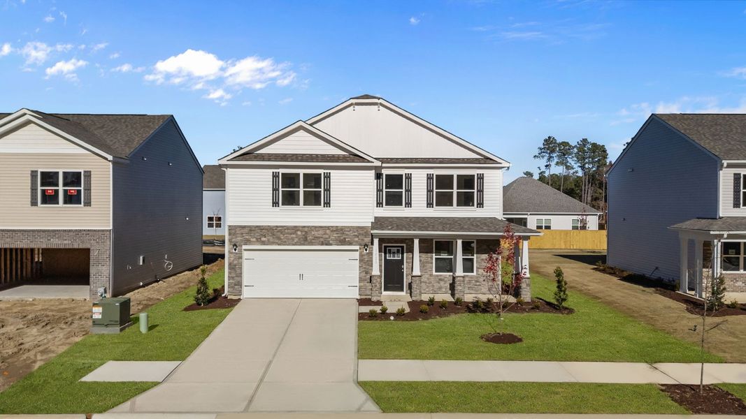 Front exterior of a new home in West New Bern, New Bern, NC, highlighting curb appeal (Image 21). Front exterior of a new home in West New Bern, New Bern, NC, highlighting curb appeal (Image 21).