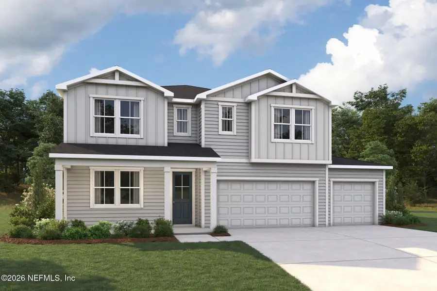 Front exterior of a new home in RiverTown, St. Johns, FL, highlighting curb appeal (Image 1). Front exterior of a new home in RiverTown, St. Johns, FL, highlighting curb appeal (Image 1).