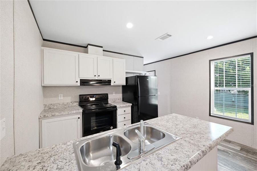 Furnished interior view inside a new home in , Brooksville (Image 7).