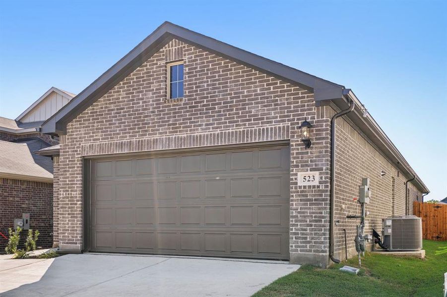 Front exterior of a new home in Simpson Crossing - Spring Series, McKinney, TX, highlighting curb appeal (Image 2). Front exterior of a new home in Simpson Crossing - Spring Series, McKinney, TX, highlighting curb appeal (Image 2).