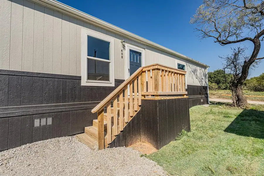 Exterior details and patio area of a home in , Runaway Bay (Image 2). Exterior details and patio area of a home in , Runaway Bay (Image 2).