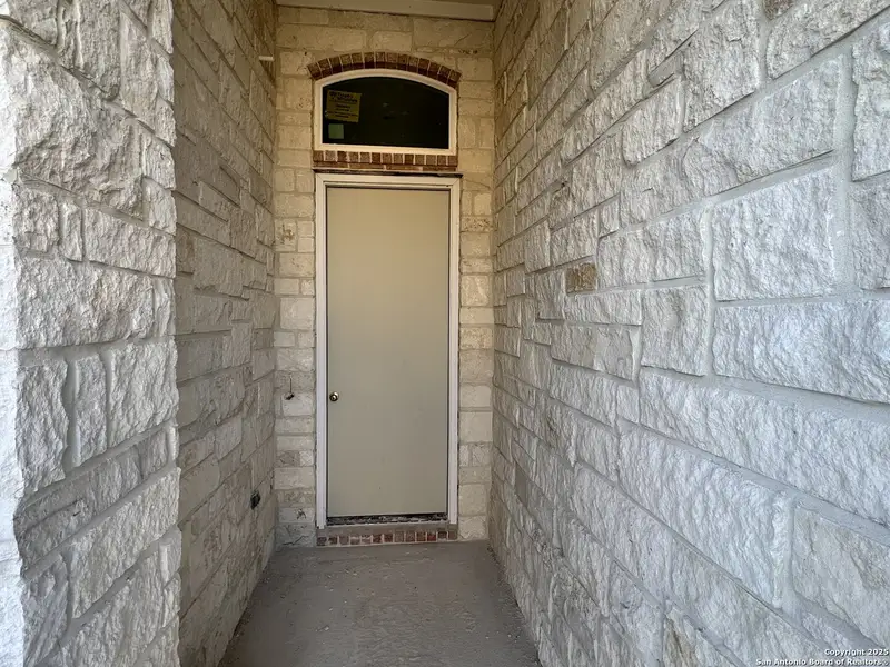 Exterior details and patio area of a home in , Castroville (Image 3).