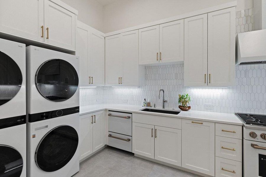 Prep Kitchen Modern cabinetry and appliances create a streamlined and functional space.
