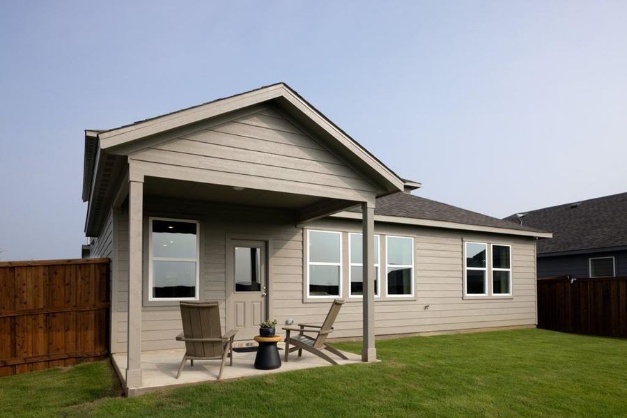 Front exterior of a new home in River Ridge, Crandall, TX, highlighting curb appeal (Image 20). Front exterior of a new home in River Ridge, Crandall, TX, highlighting curb appeal (Image 20).