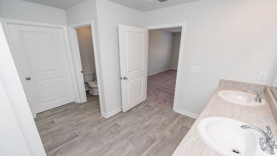 Representative unfurnished interior of a home built from the CALI by D.R. Horton in Jordanville Farms, Galivants Ferry (Image 36).