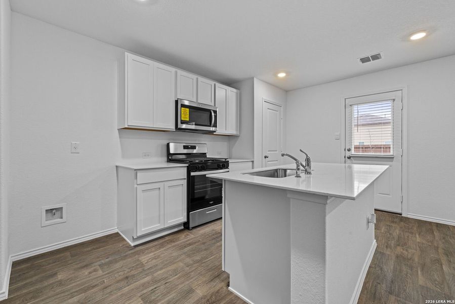 Furnished interior view inside a new home in Avenida, Converse (Image 5).