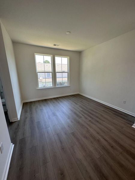 Spacious, unfurnished interior of a new home in Clear Springs Townhomes, North Charleston (Image 6).