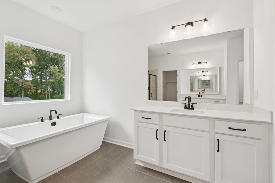 Primary Bath featuring the AW Collection® Rosemary - Organic textures meet bold design. Primary Bath featuring the AW Collection® Rosemary - Organic textures meet bold design.