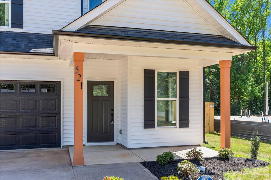 Exterior details and patio area of a home in , Charlotte (Image 3).