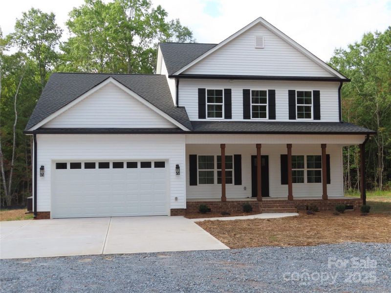 Front exterior of a new home in , York, SC, highlighting curb appeal (Image 1).